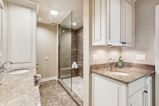 27 N Tower Rd Unit 27, Oak Brook, IL 60523 - bathroom with vanity, a shower stall, toilet, and baseboards