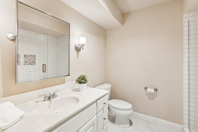 27 N Tower Rd Unit 27, Oak Brook, IL 60523 - bathroom with toilet, vanity, tiled shower, marble finish flooring, and baseboards