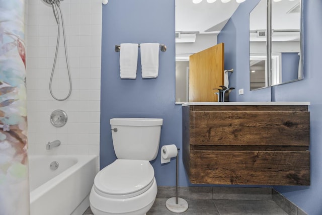 full bathroom with vanity, shower / tub combo, and toilet