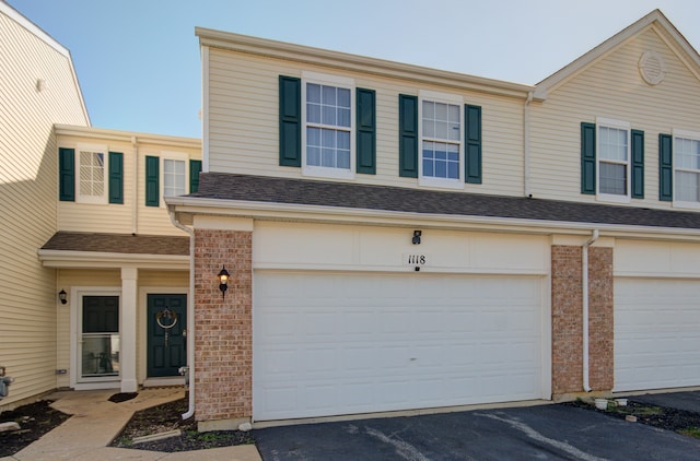 view of property with a garage