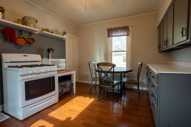 kitchen featuring light hardwood / wood-style floors, white appliances, ornamental molding, and tasteful backsplash