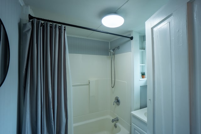 bathroom with vanity and shower / bath combo