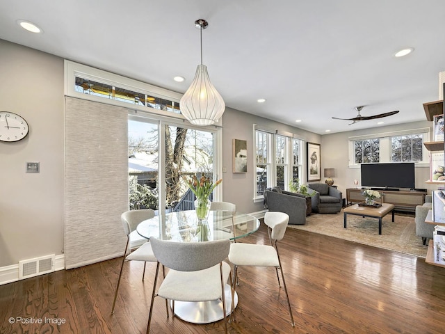 dining space featuring ceiling fan, plenty of natural light, and hardwood / wood-style floors