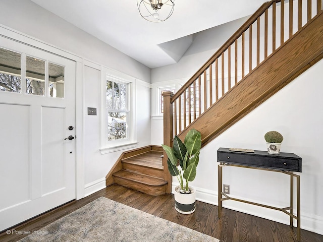 entryway with dark wood-type flooring