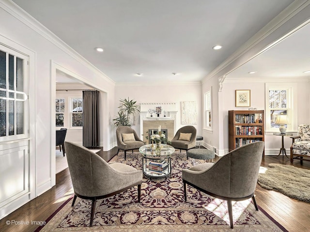 living room featuring dark hardwood / wood-style floors and ornamental molding