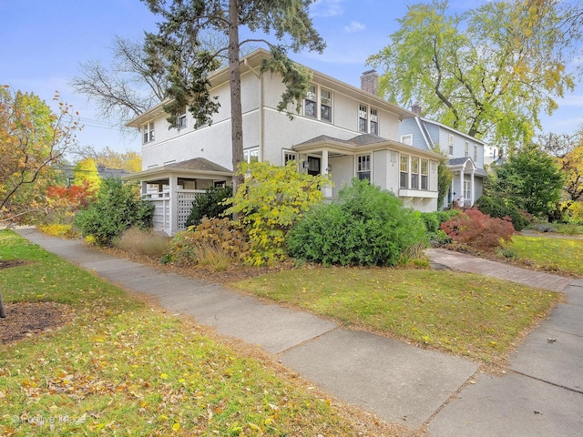 view of front of house featuring a front lawn