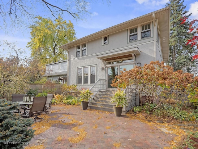 rear view of property with a patio