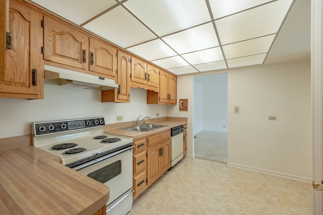 kitchen with sink and white appliances