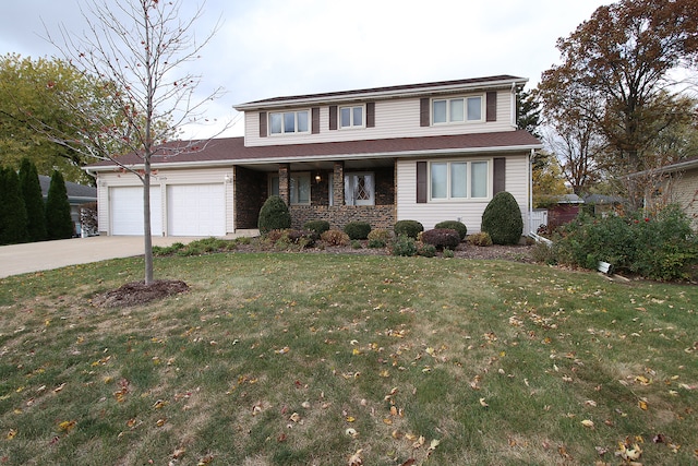 view of property featuring covered porch, a garage, and a front lawn