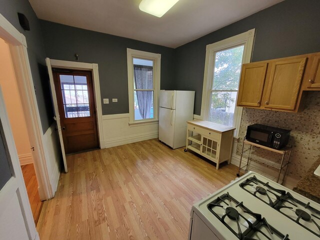 empty room featuring hardwood / wood-style flooring