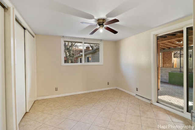 unfurnished bedroom with light tile patterned floors and ceiling fan