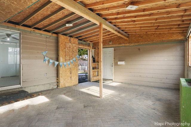 interior space featuring wood walls