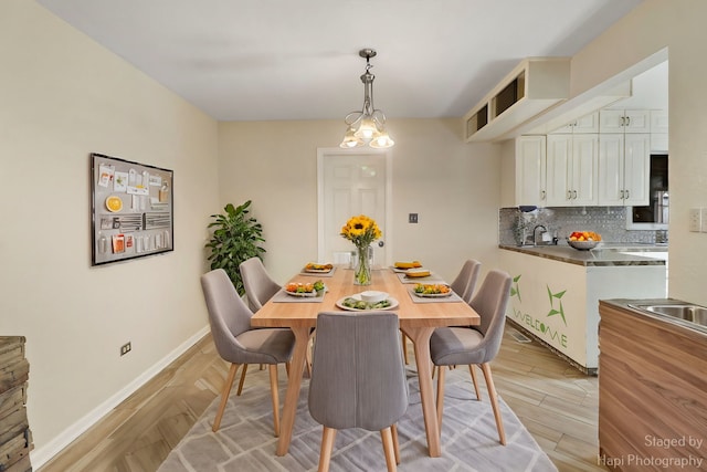 dining room with light hardwood / wood-style flooring