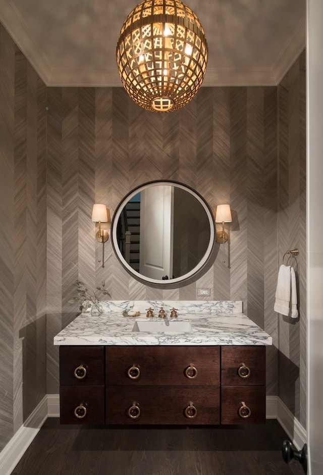 bathroom with vanity and crown molding