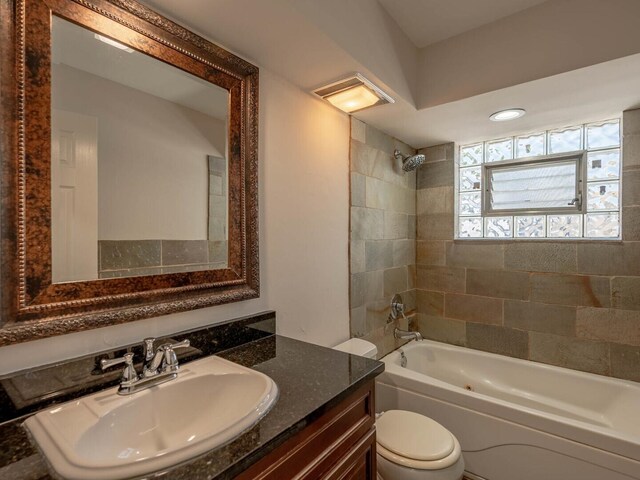 unfurnished bedroom with a baseboard radiator, light hardwood / wood-style flooring, a closet, and ceiling fan