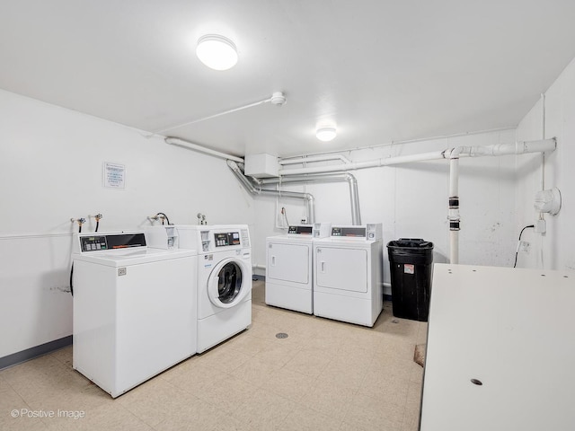 laundry room featuring washing machine and dryer