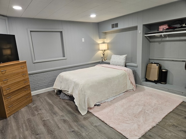 bedroom featuring dark hardwood / wood-style floors