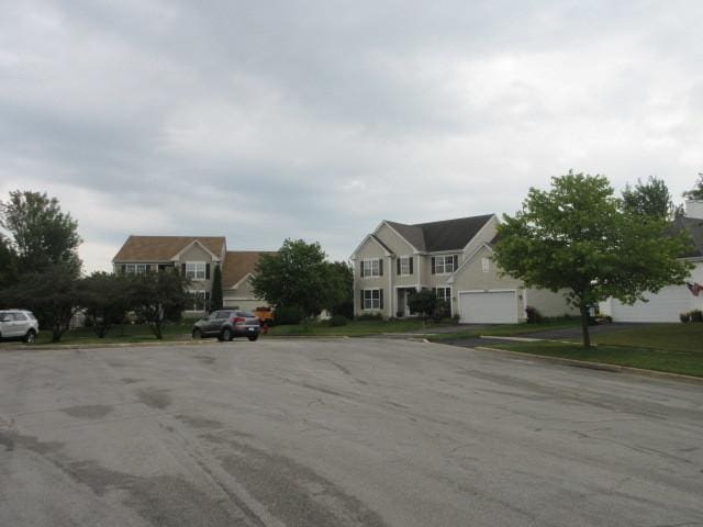 view of street featuring curbs