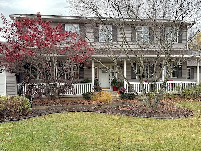 view of front facade featuring a porch and a front yard