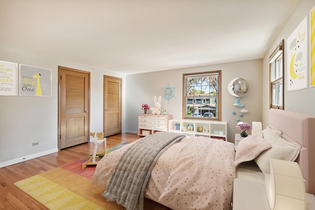 bedroom featuring wood-type flooring