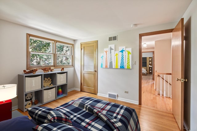 bedroom featuring hardwood / wood-style floors