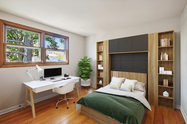 bedroom featuring light wood-type flooring