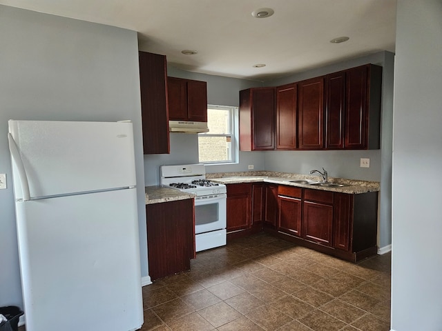 kitchen featuring white appliances and sink