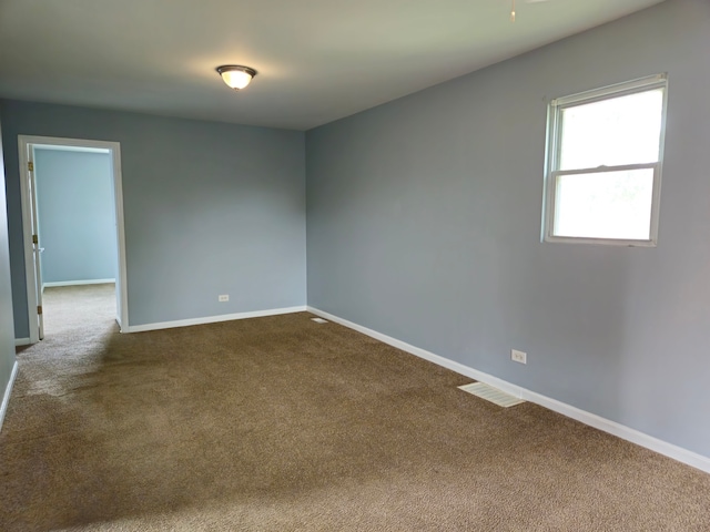 spare room with carpet flooring