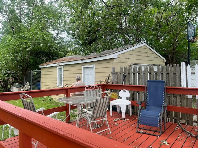 deck featuring a shed