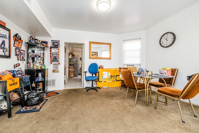 dining space featuring carpet and cooling unit