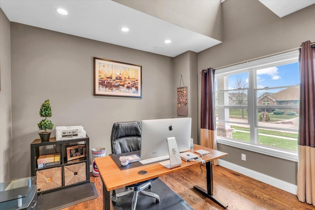 office space featuring hardwood / wood-style floors