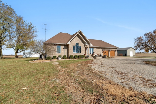 ranch-style house with a front yard and a garage