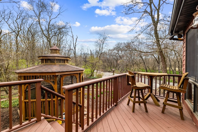 wooden deck with a gazebo