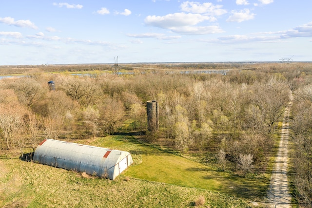 birds eye view of property featuring a rural view