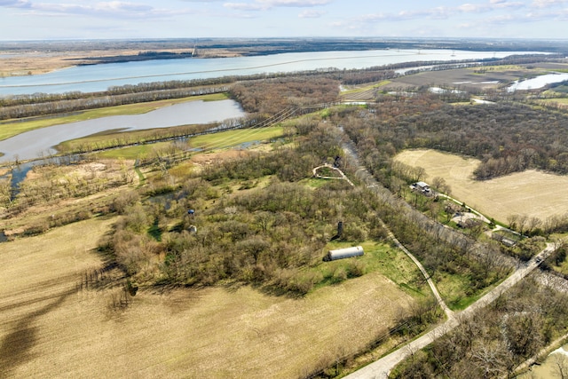 birds eye view of property with a rural view and a water view