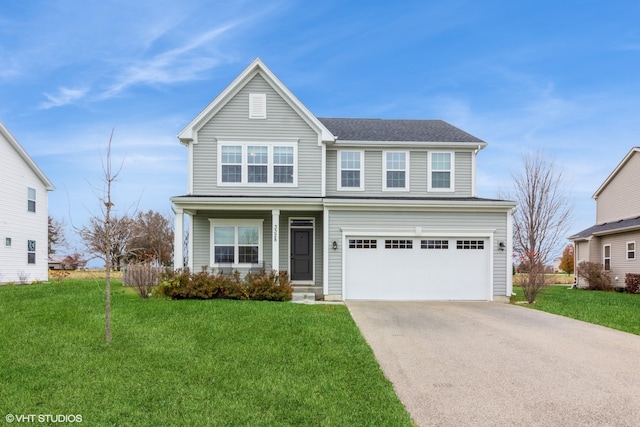 front of property featuring a garage and a front lawn