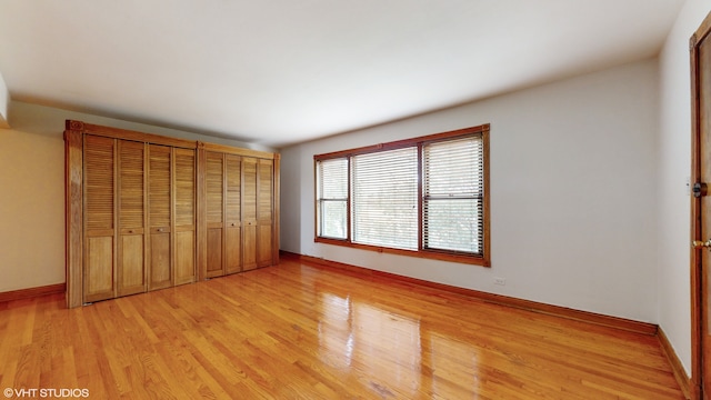 unfurnished bedroom with light hardwood / wood-style floors