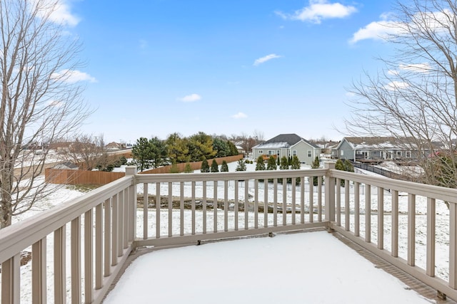 view of snow covered deck