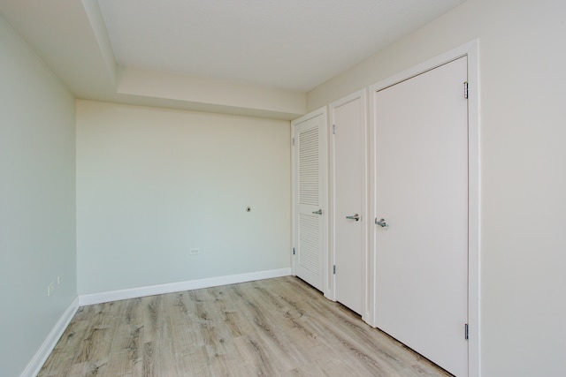 unfurnished bedroom featuring light hardwood / wood-style floors