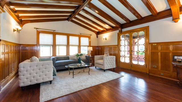 living room with french doors, dark wood-type flooring, and vaulted ceiling with beams