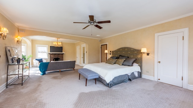 bedroom with crown molding, ceiling fan, and carpet floors