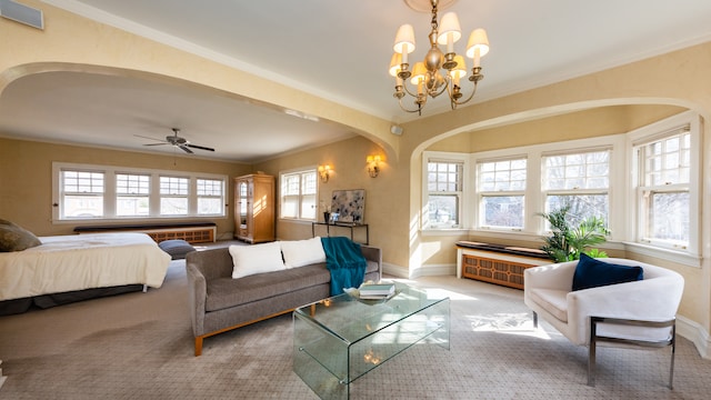 bedroom with multiple windows, ornamental molding, and carpet floors