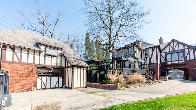 view of side of property with a garage