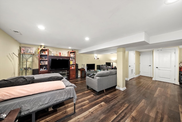 bedroom featuring dark hardwood / wood-style flooring