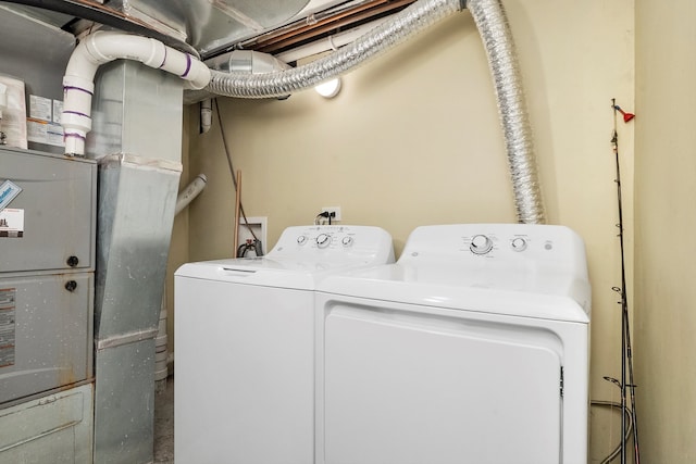 clothes washing area with heating unit and washing machine and clothes dryer