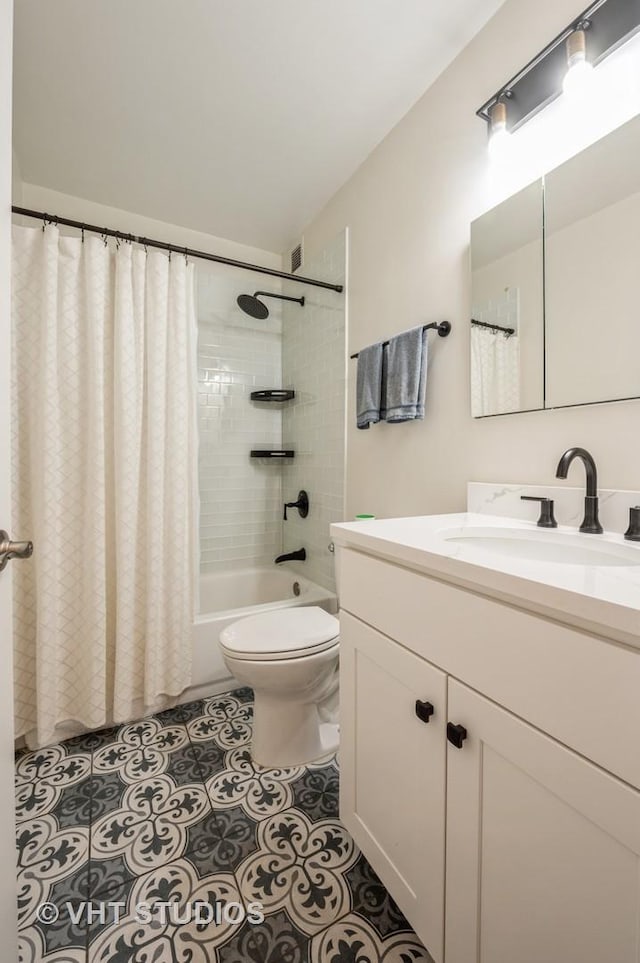 1325 N State Pkwy Unit 11F, Chicago, IL 60610 - bathroom with shower / bath combo, vanity, toilet, and tile patterned flooring