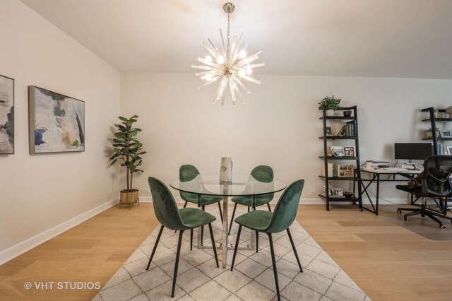1325 N State Pkwy Unit 11F, Chicago, IL 60610 - dining room with light wood-style flooring, a chandelier, baseboards, and an office area