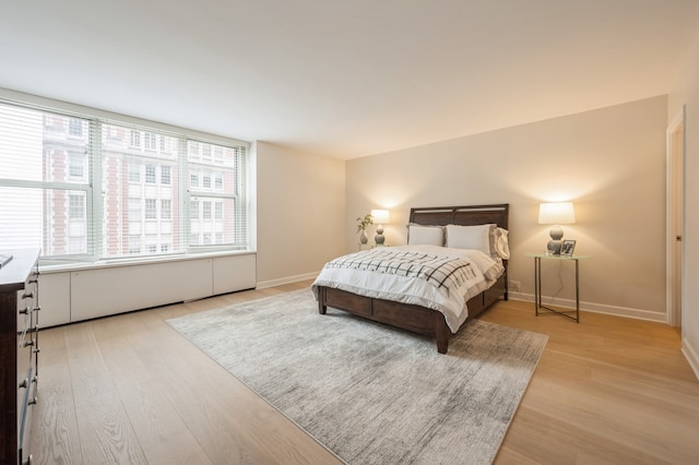 bedroom featuring light hardwood / wood-style floors