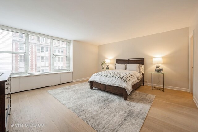 1325 N State Pkwy Unit 11F, Chicago, IL 60610 - bedroom featuring light wood-style flooring and baseboards
