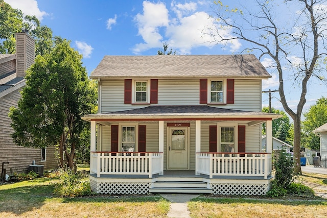 view of front of property featuring covered porch and central AC